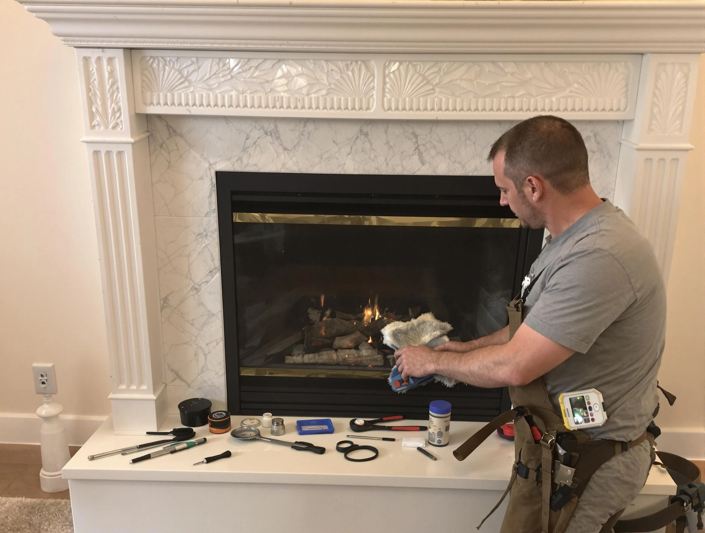 Reading Chimney Sweep performing fireplace maintenance in Reading, MA